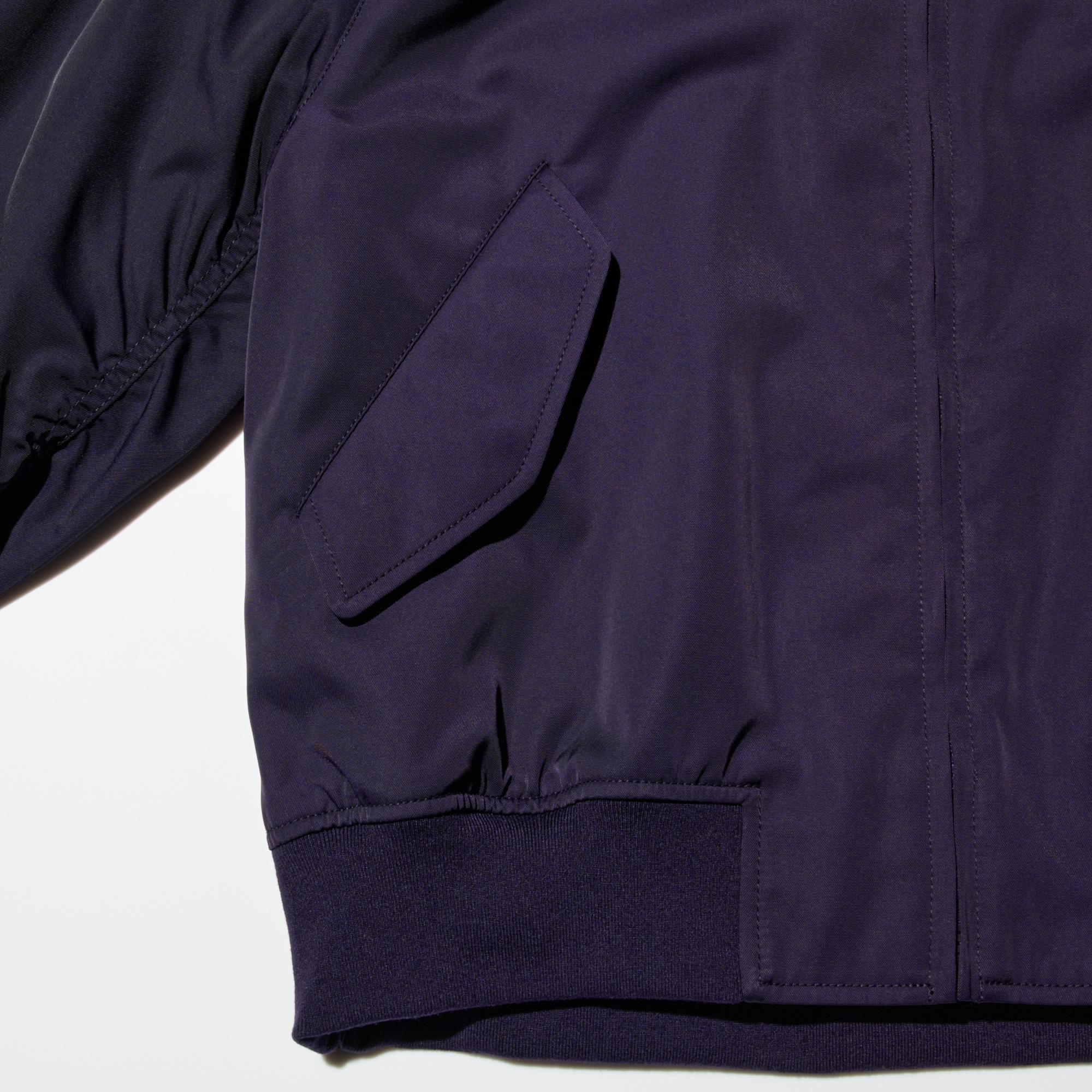 Stylish design updated with added flap pockets.