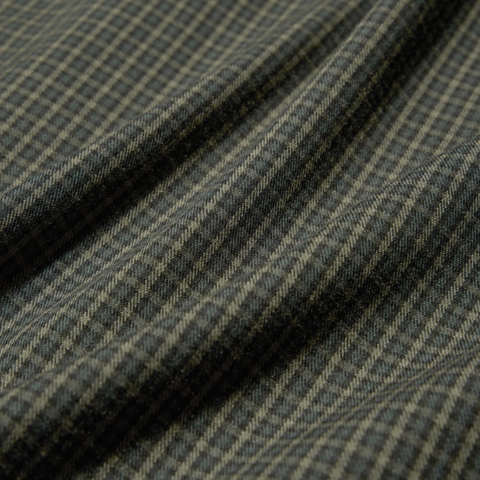 Warm polyester-rayon fabric with an elegant brushed feel.