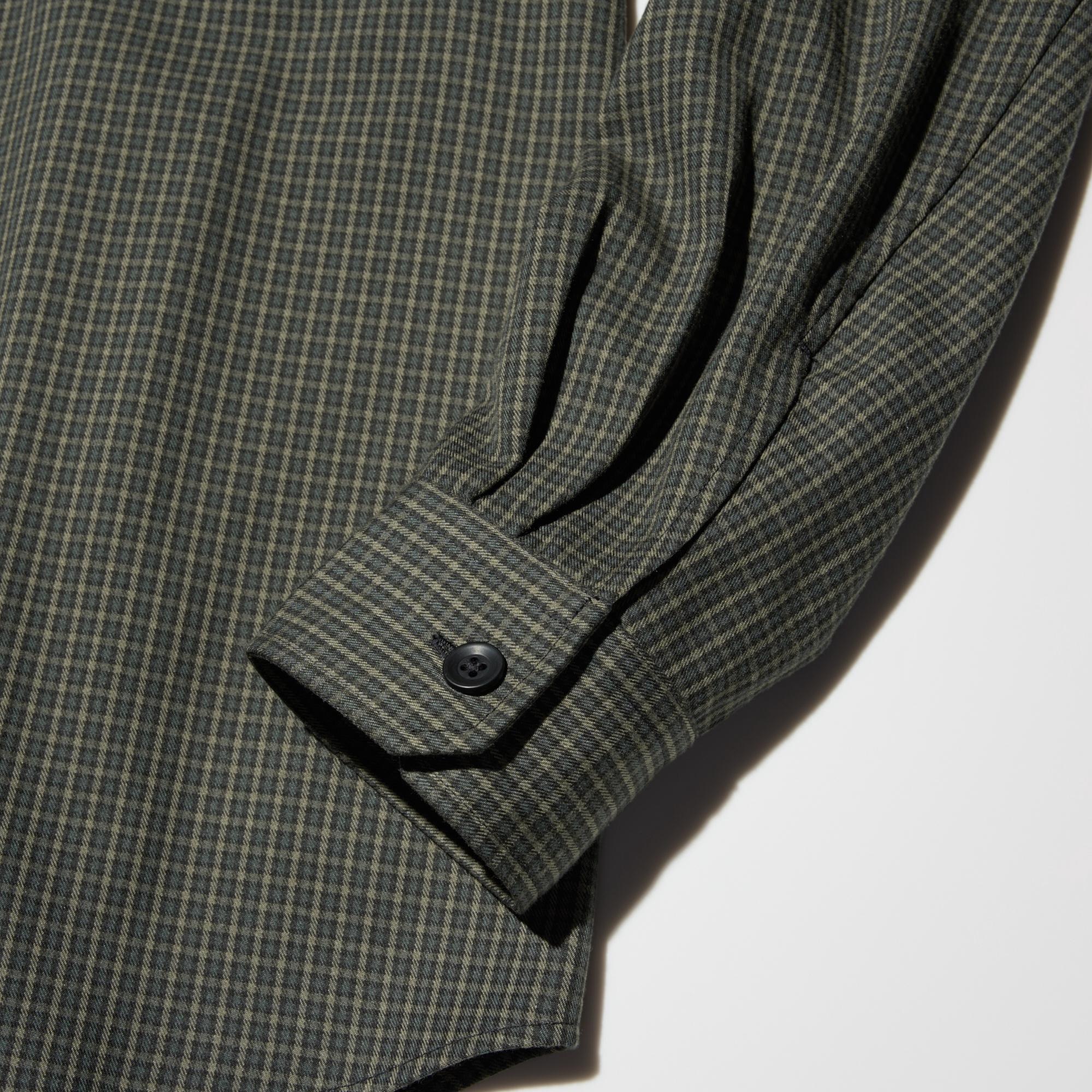 Two-piece sleeve construction with elegant stitching.
