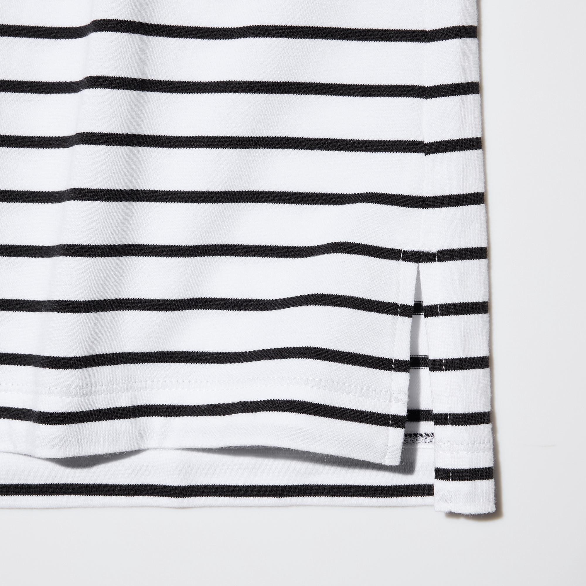 Classic relaxed silhouette and basic length. Side slits and asymmetric hem add a style accent.