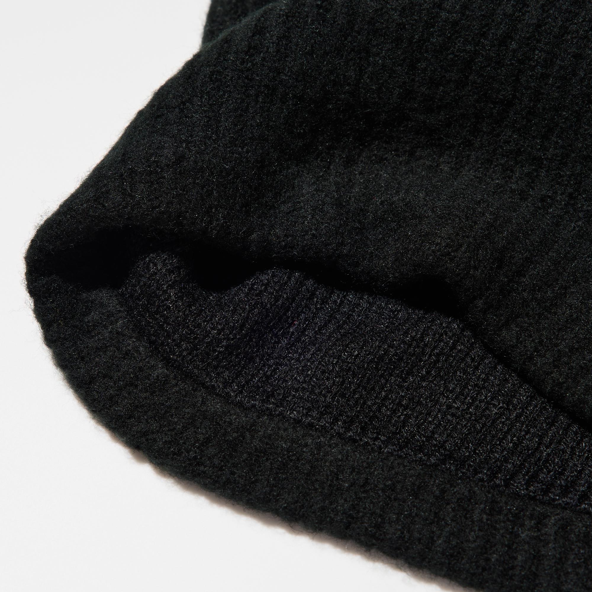 Жылу сіңіру және жылуды сақтау технологиясы бар 'HEATTECH' жүн төсемі.