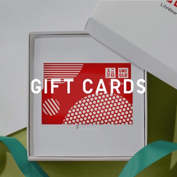 Gift Cards text overlayed on a red gift card in an open box