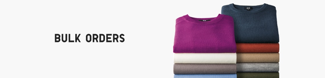image of sweaters stacked up