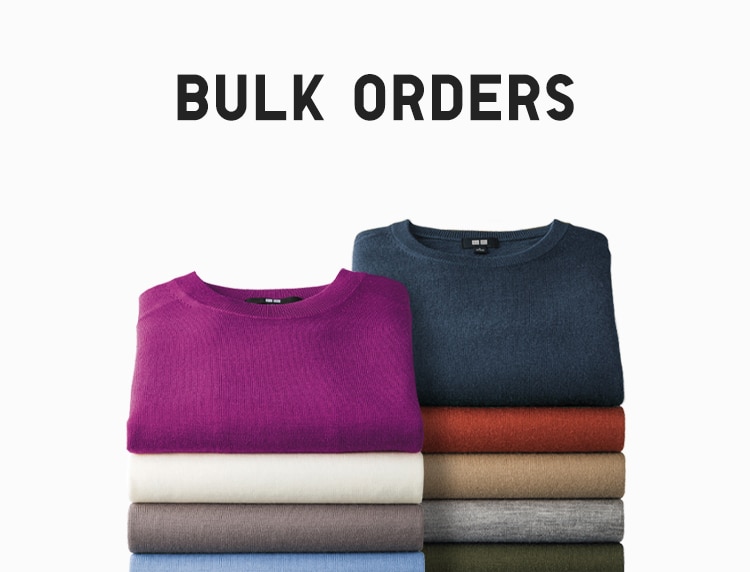 image of sweaters stacked up